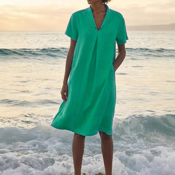 Laurie - שמלת שרוולים קצרים עם כיסים