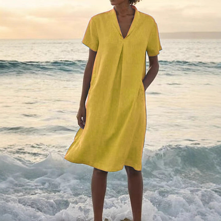 Laurie - שמלת שרוולים קצרים עם כיסים