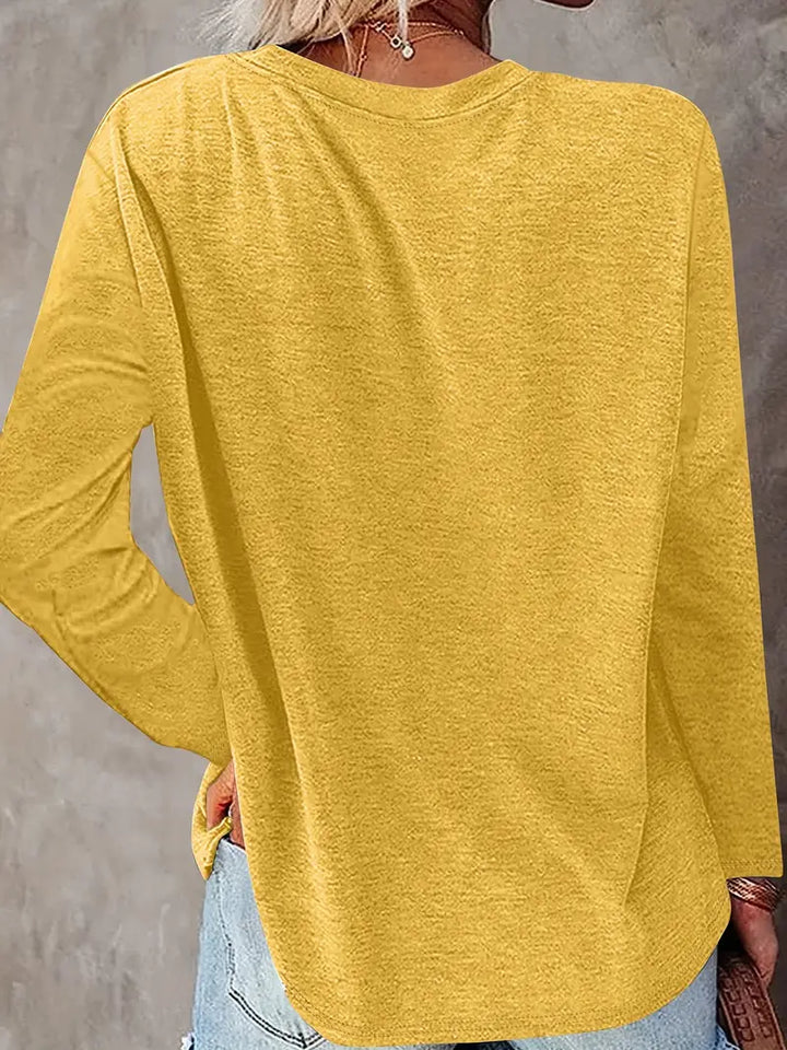 Levine - טוניקה אלגנטית עם שרוולים ארוכים והדפס חמניות