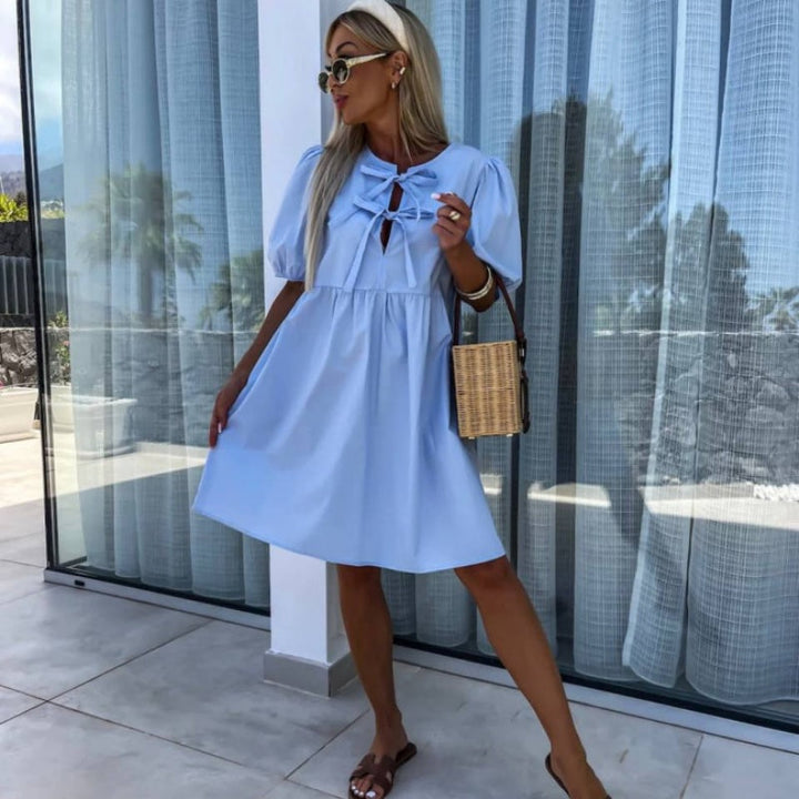 Oana - שמלה מסוגננת עם עניבת פרפר ושרוולים תפוחים