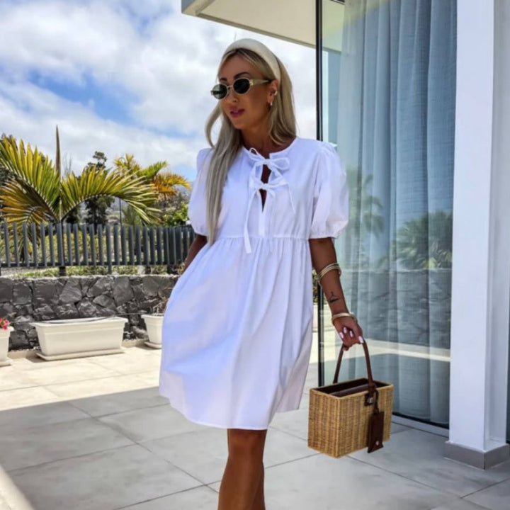 Oana - שמלה מסוגננת עם עניבת פרפר ושרוולים תפוחים